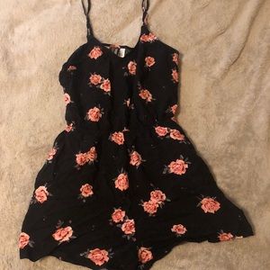 black flowerprint ruffled romper